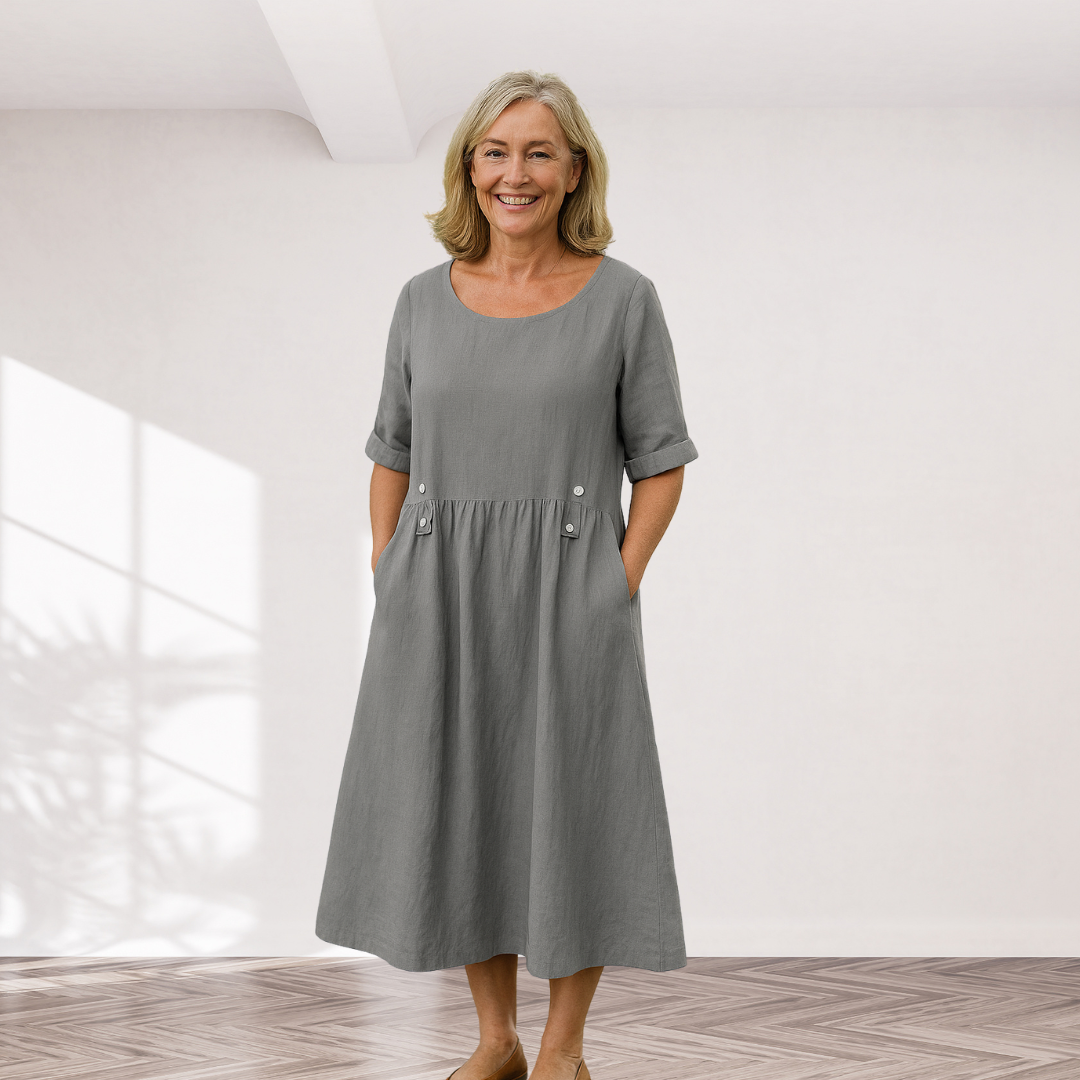 Cavell™ – Losvallende Jurk met Elegante Knoopdetails & Zakken