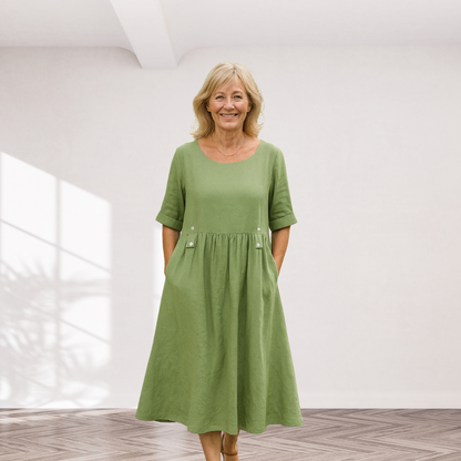 Cavell™ – Losvallende Jurk met Elegante Knoopdetails & Zakken